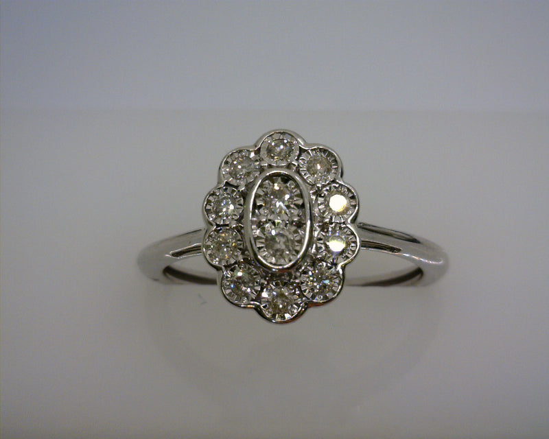 10K WG OVAL DIAMOND RING