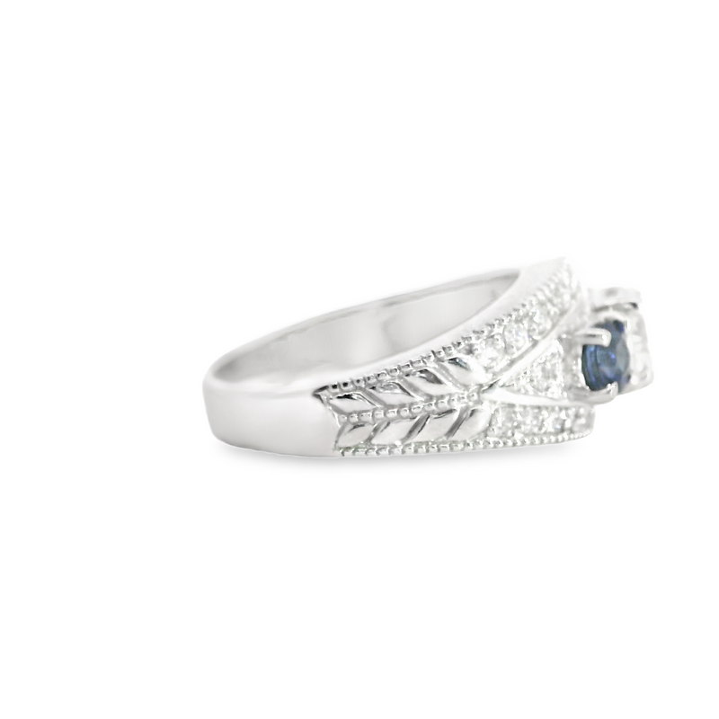 14K WG SAPPHIRE & DIAMOND ENGAGEMENT RING