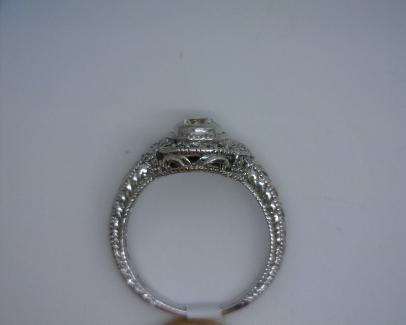 14K WG VINTAGE STYLE  HALO DIAMOND RING