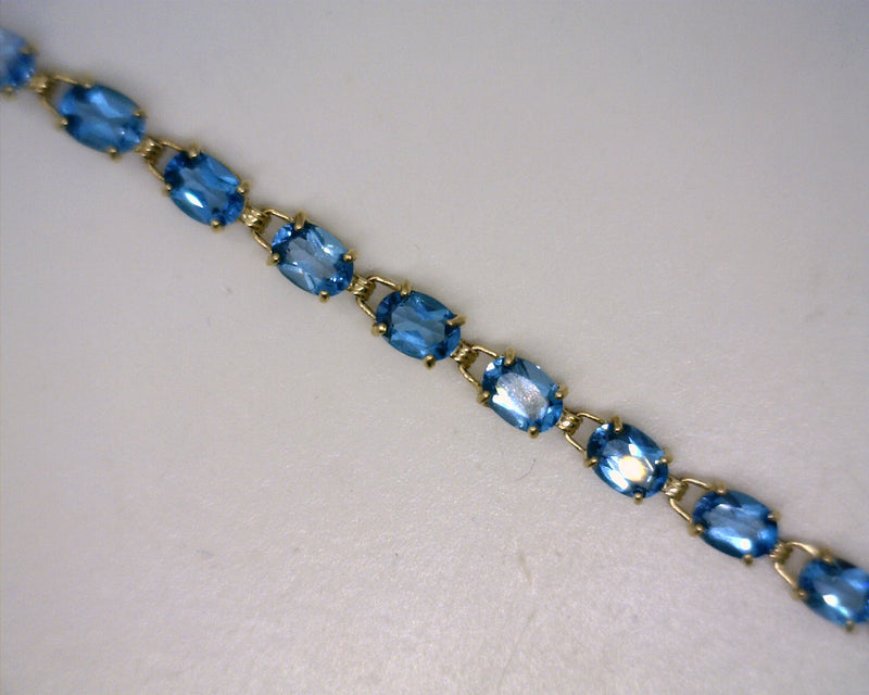 14K YG TOPAZ BRACELET