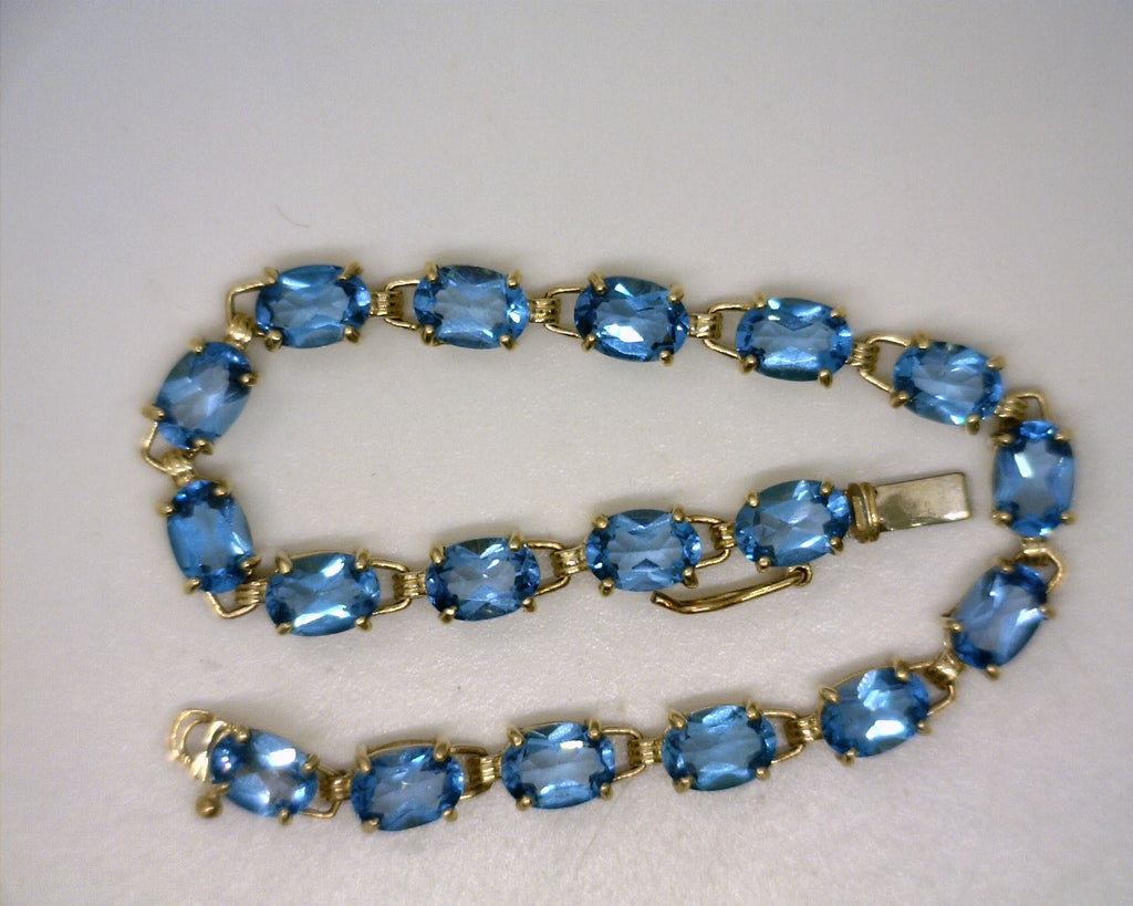 14K YG TOPAZ BRACELET