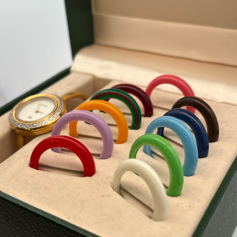 Ladies Gucci Thin Watch with Interchangable Bezels