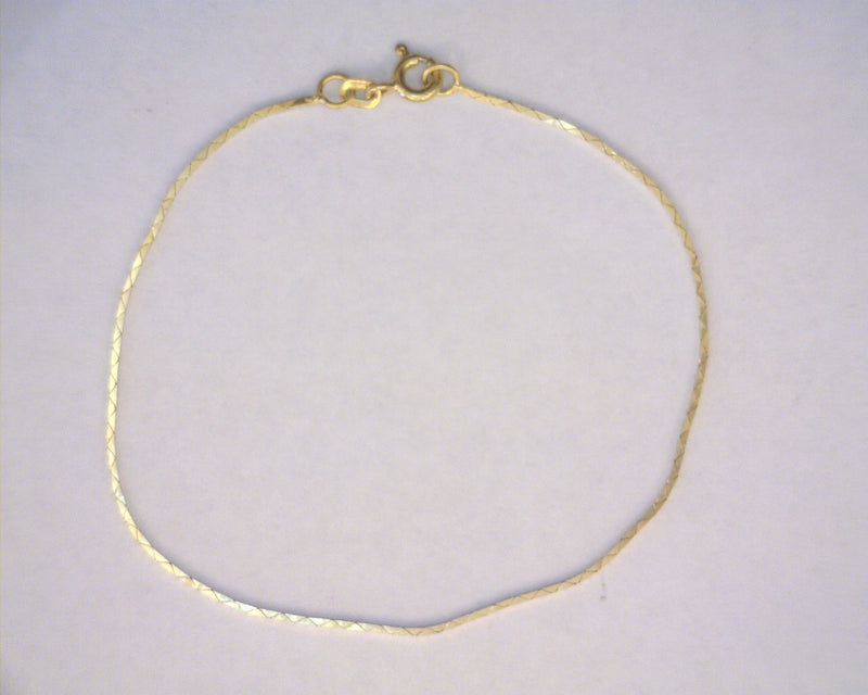 14K YG BRACELET 7" 1.2 GRAMS