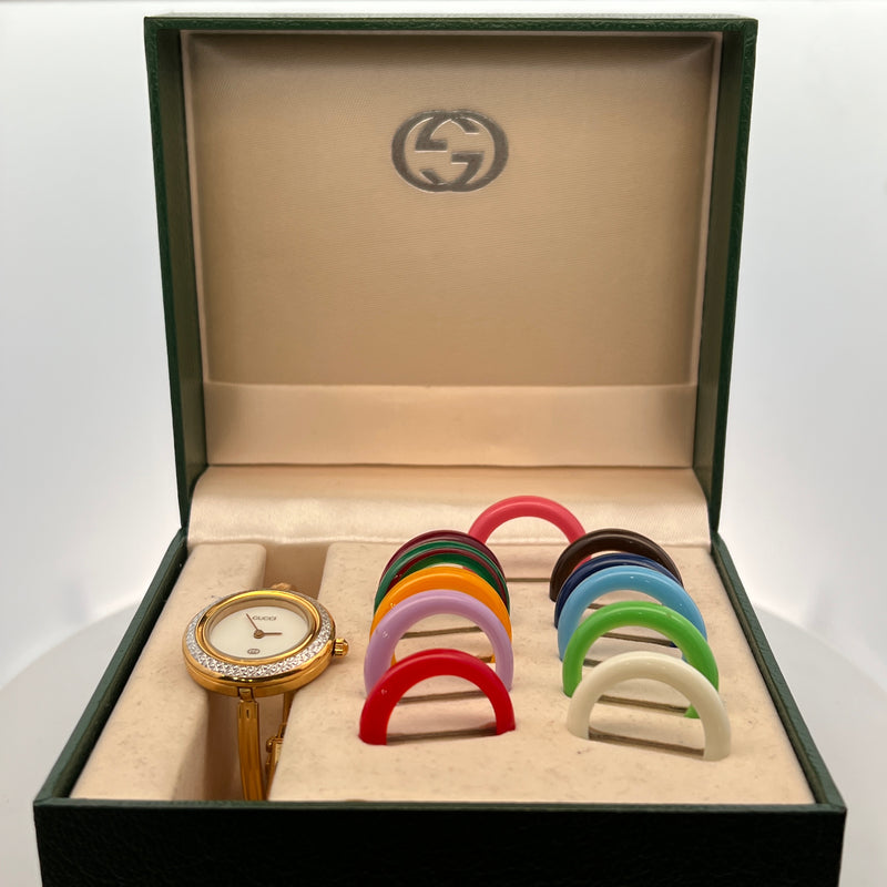 Ladies Gucci Thin Watch with Interchangable Bezels