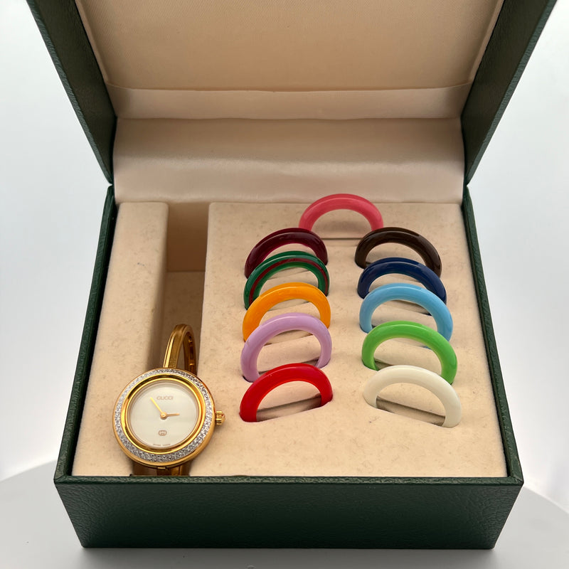 Ladies Gucci Thin Watch with Interchangable Bezels