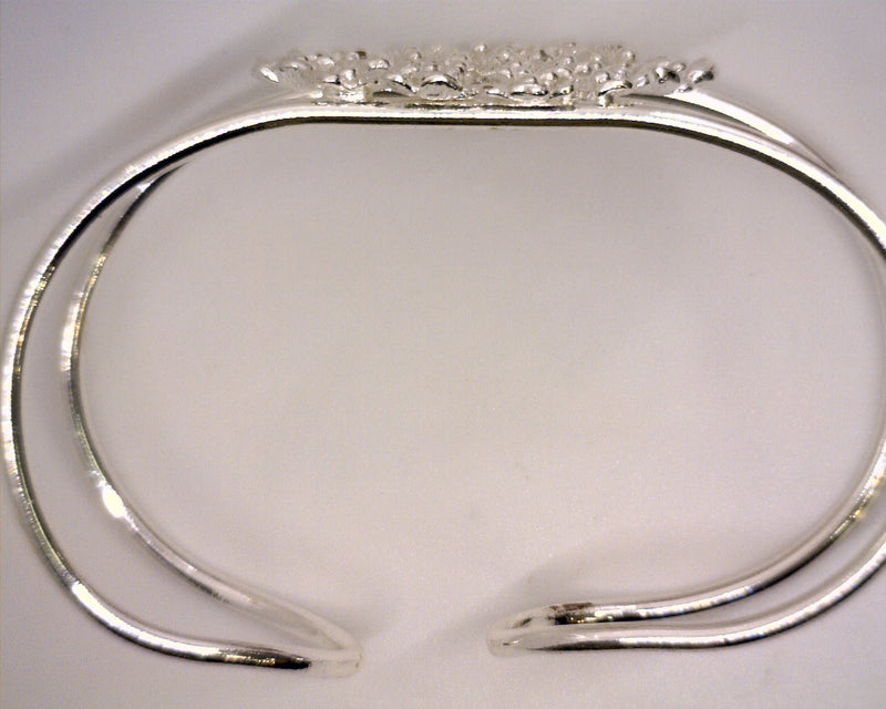 Silver Tone Wide Wire Cuff With Flower Center